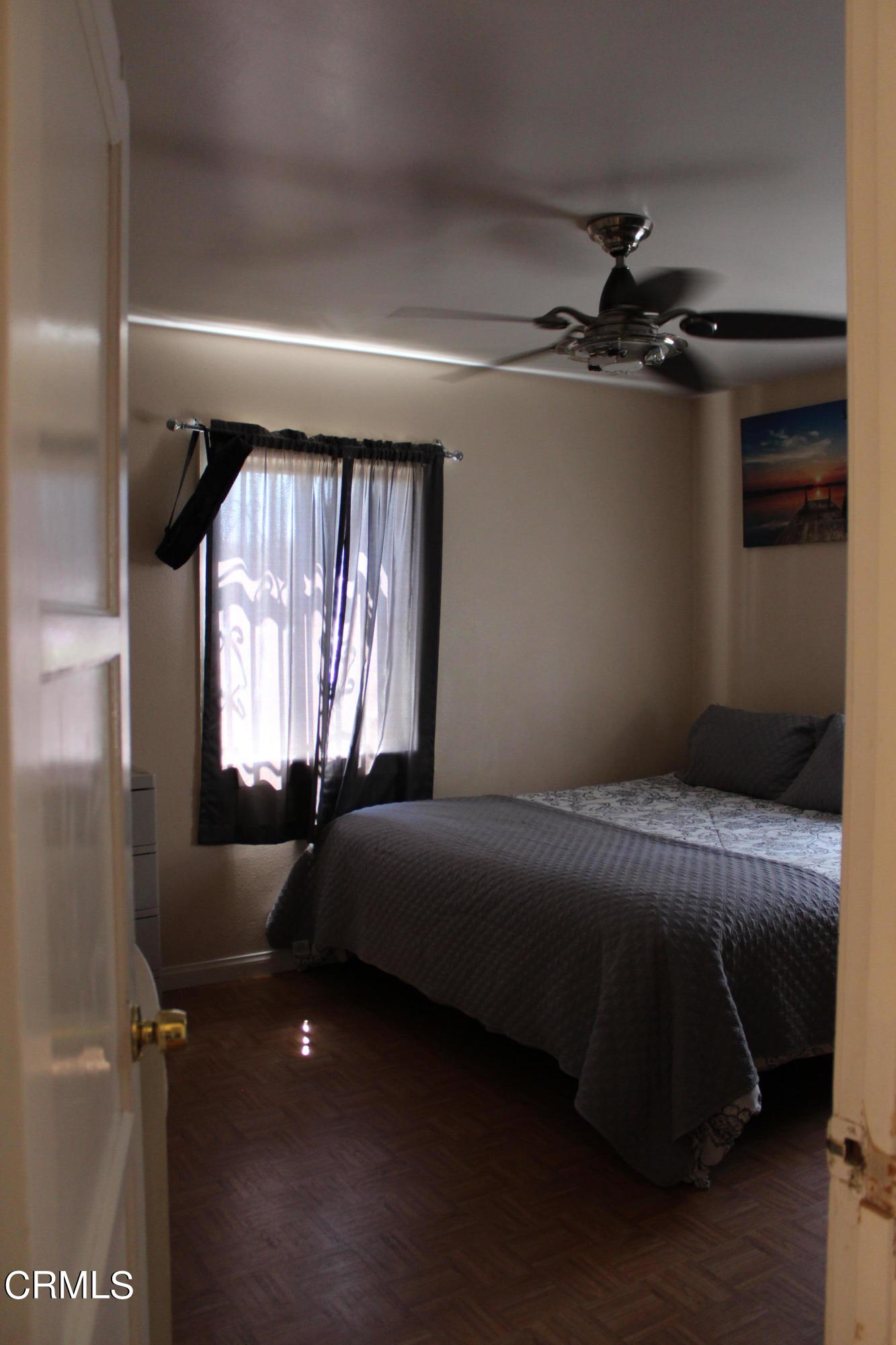 1111 South M Street Oxnard, CA 93033 - Photo 8 of 22 a bedroom with a bed and window