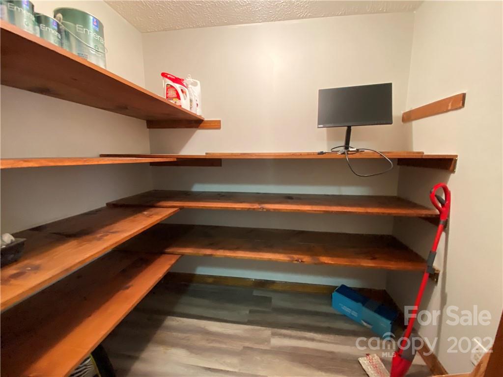 1081 Blalock Dairy Road Roxboro, NC 27574 - Photo 8 of 25 a view of storage and utility room