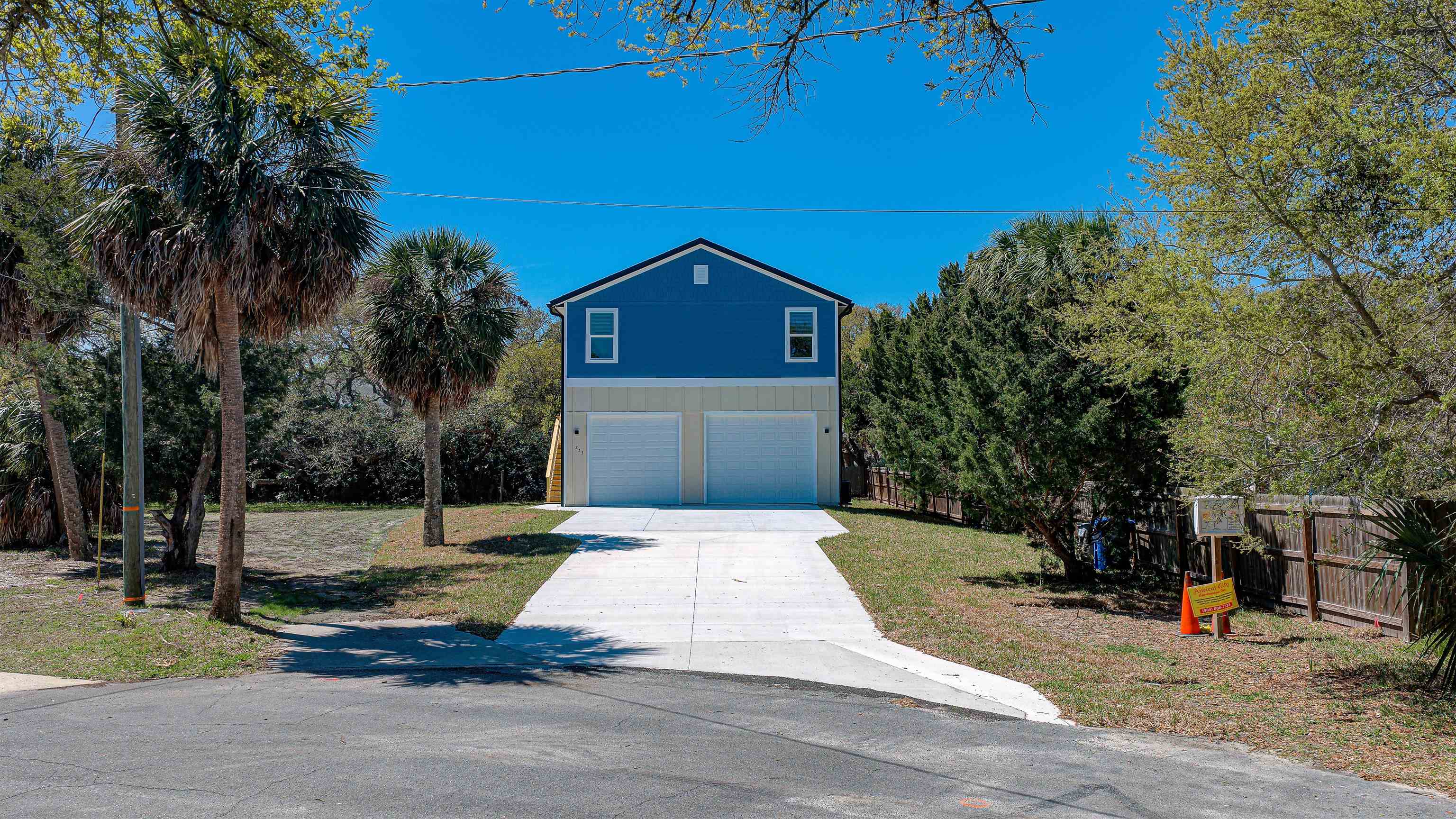 253 Desoto Road St. Augustine, FL 32080 - Photo 1 of 25 View of front of home with concrete driveway and a garage