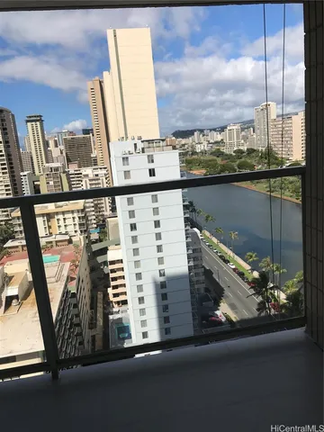 a view of a balcony with chairs