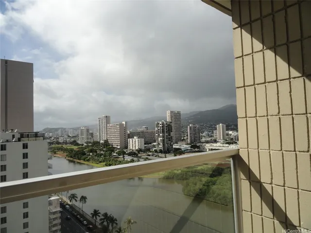 a view of swimming pool from a balcony