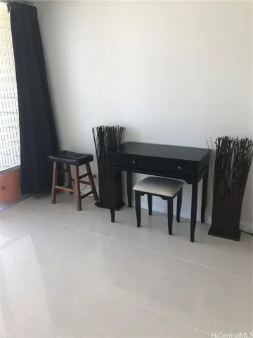 a room with furniture and a piano