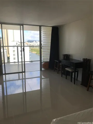 a workspace with furniture and a window