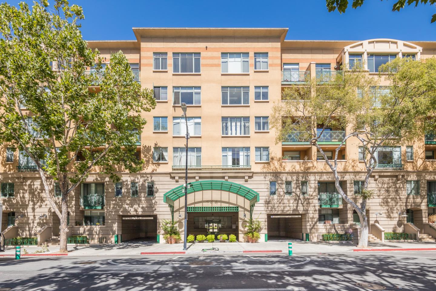 144 South 3rd Street, Unit 603 San Jose, CA 95112 - Photo 1 of 37 a front view of a building with a garden