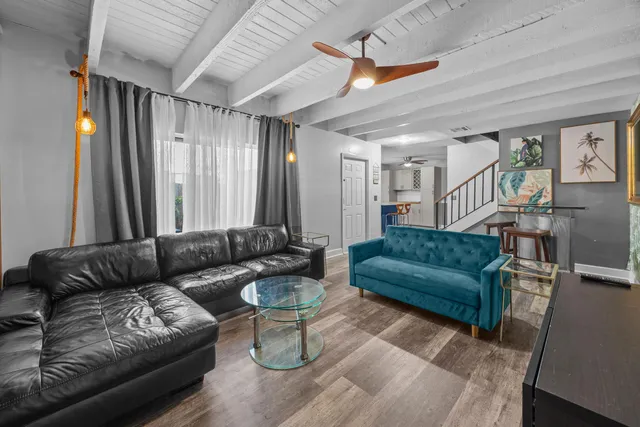 a living room with furniture and a couch