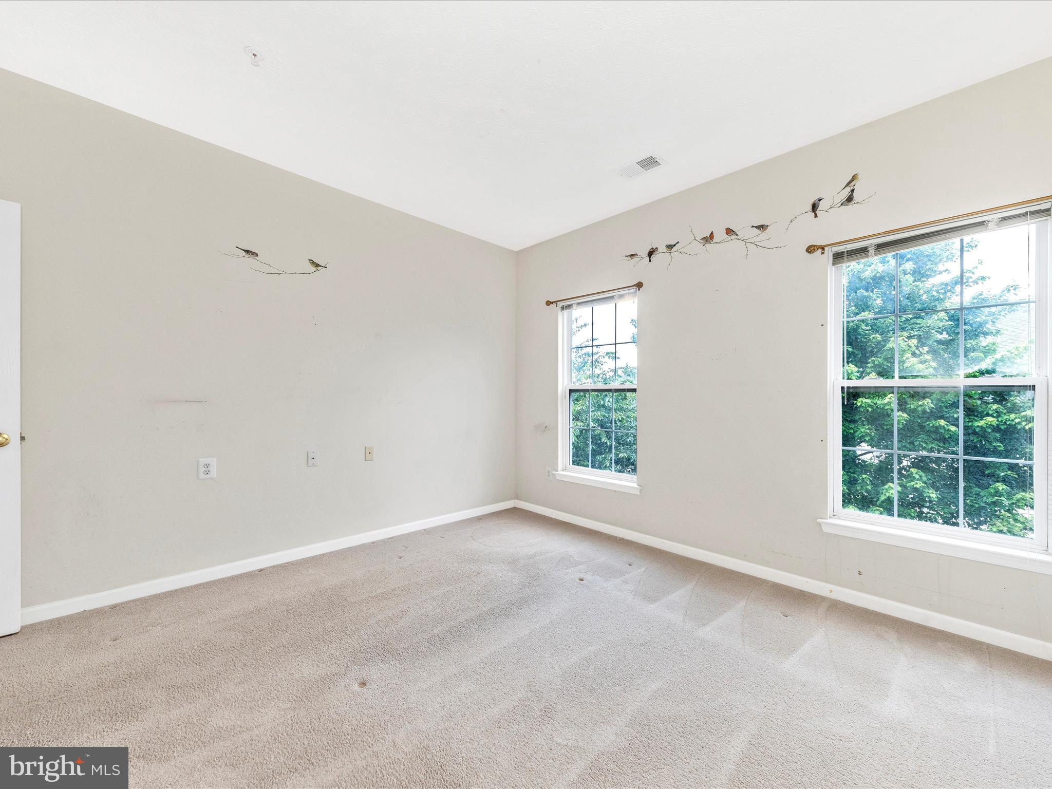 6125 Springwater Place, Unit K Frederick, MD 21701 - Photo 25 of 63 a view of an empty room with a window