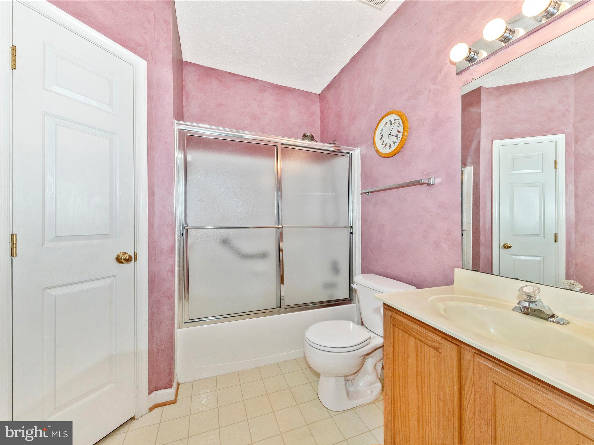 6125 Springwater Place, Unit K Frederick, MD 21701 - Photo 28 of 63 a bathroom with a sink a toilet and shower
