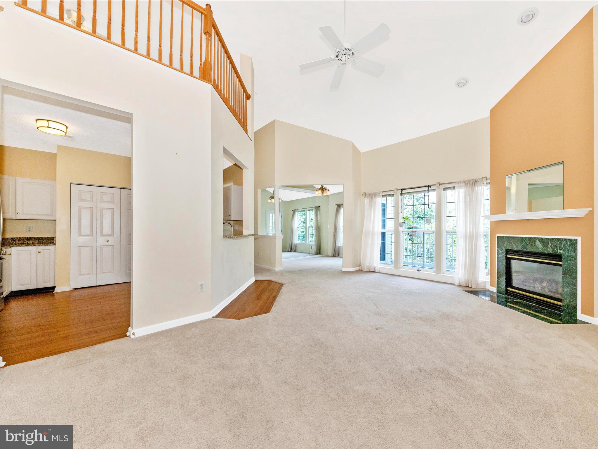 6125 Springwater Place, Unit K Frederick, MD 21701 - Photo 3 of 63 a view of an empty room with a fireplace and a window