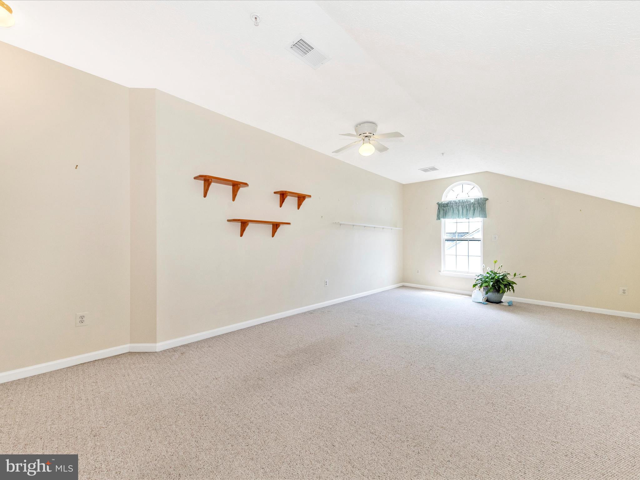 6125 Springwater Place, Unit K Frederick, MD 21701 - Photo 31 of 63 a view of a livingroom with a window