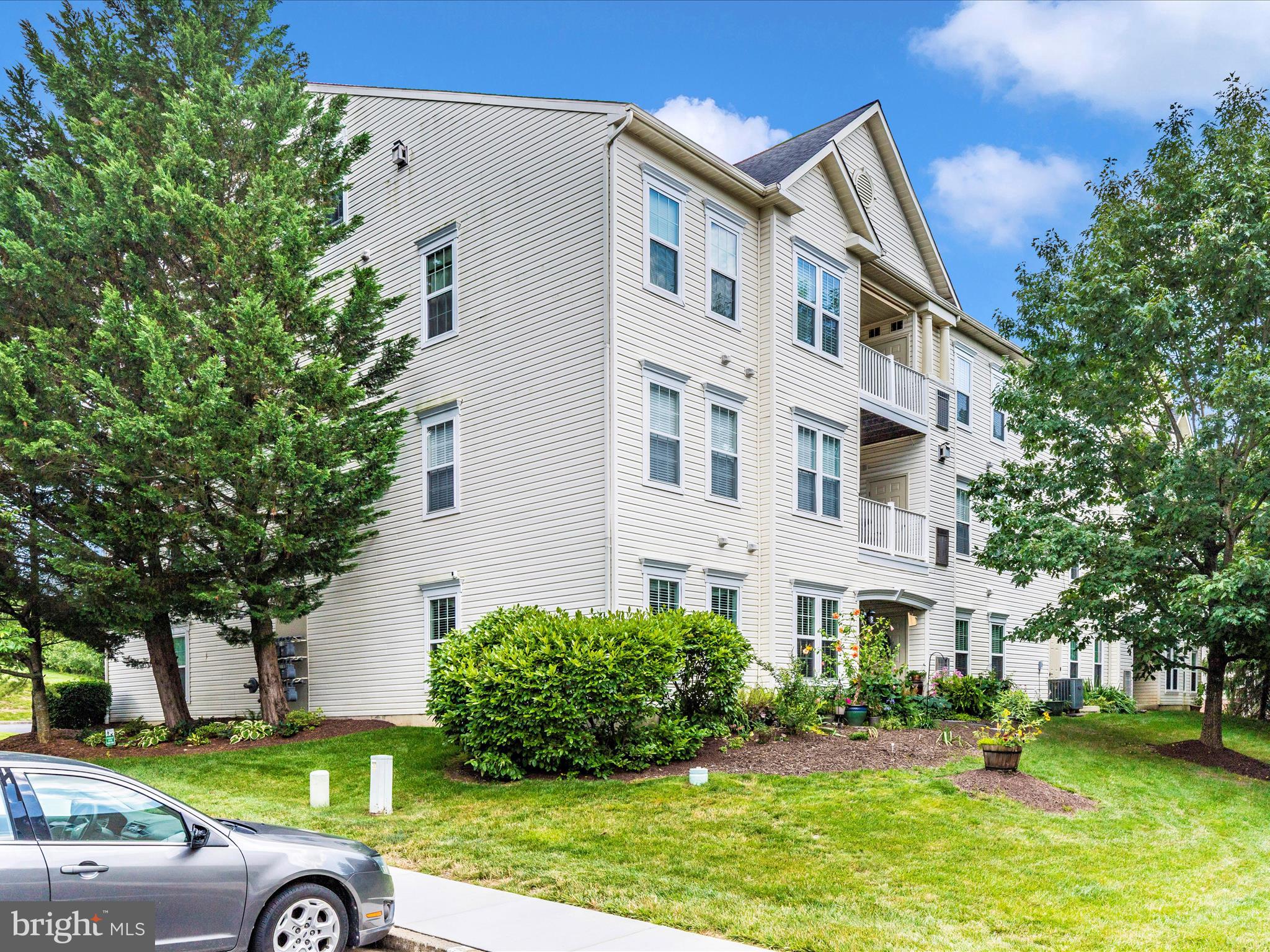 6125 Springwater Place, Unit K Frederick, MD 21701 - Photo 41 of 63 a house view with a garden space