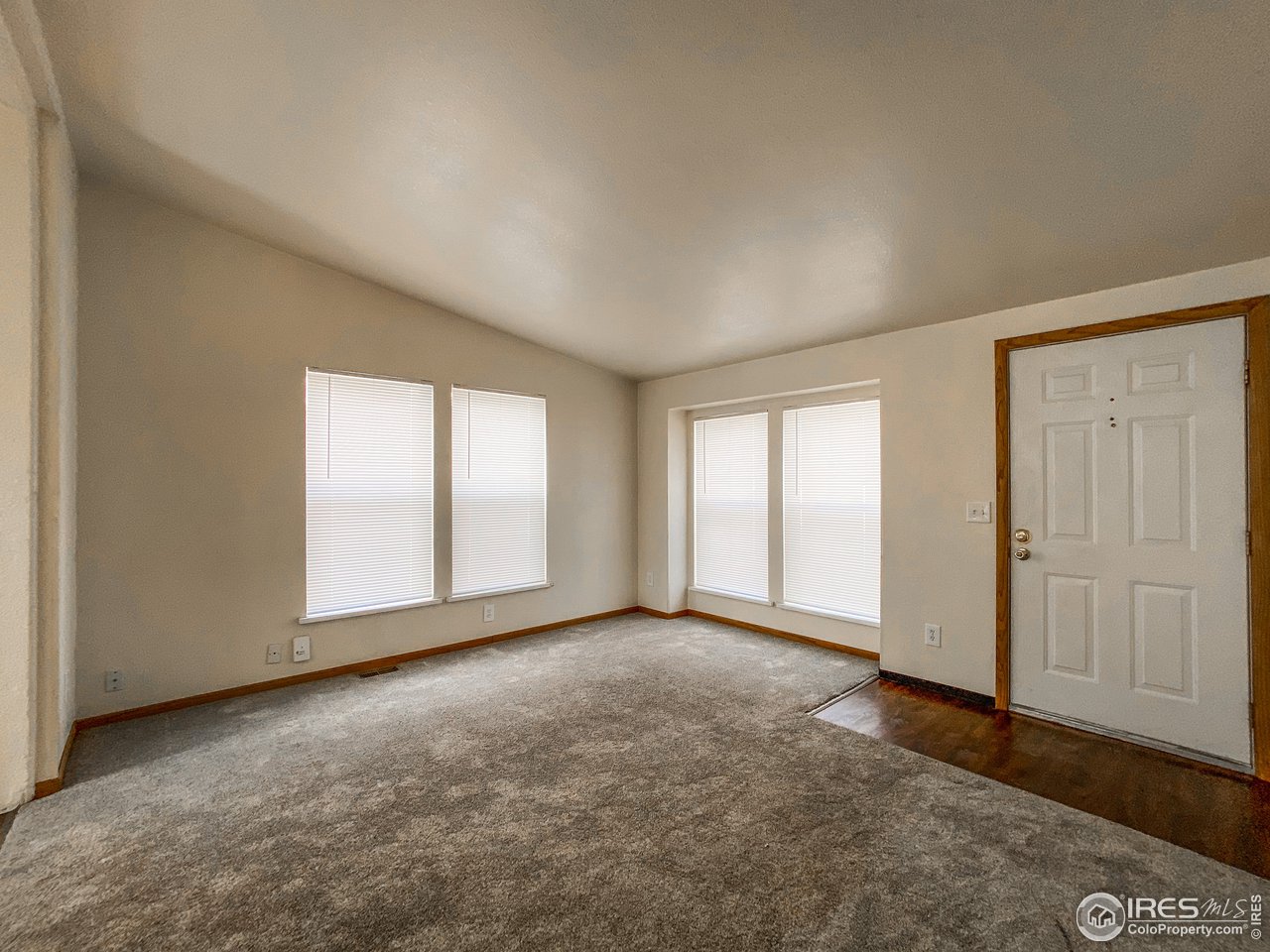 24-26 Reed Place Longmont, CO 80504 - Photo 6 of 20 Living Room/Front Door