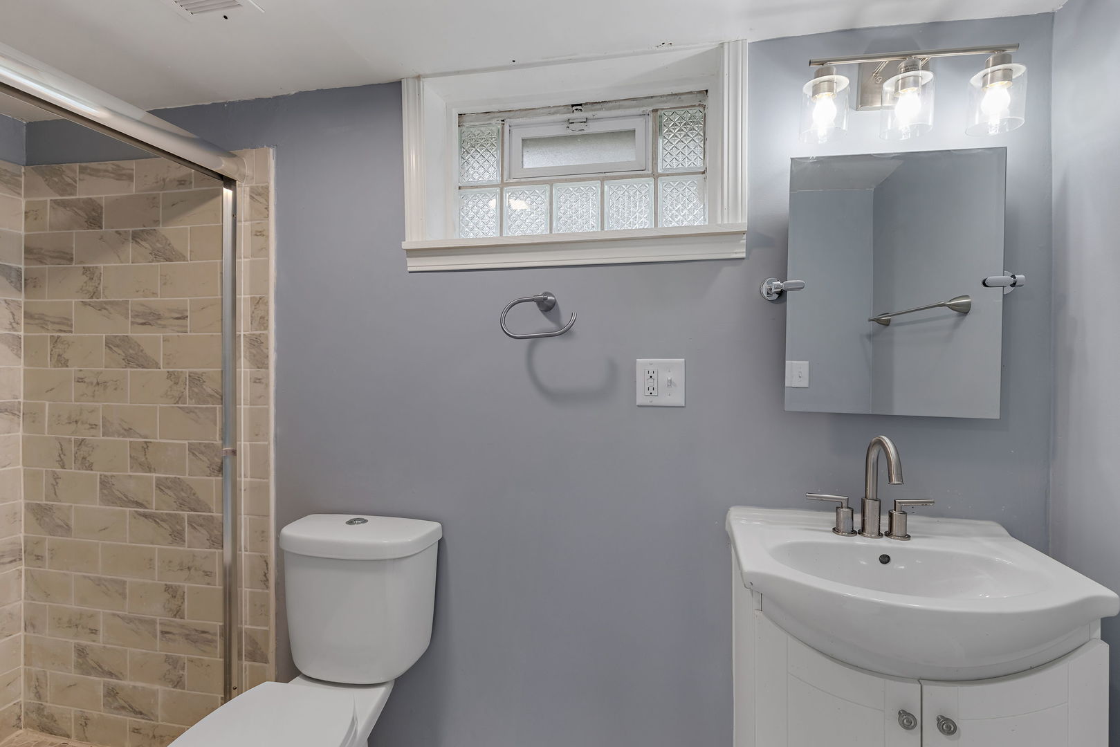 320 Streamside Drive Harvey, IL 60426 - Photo 15 of 26 a bathroom with a sink a toilet and mirror