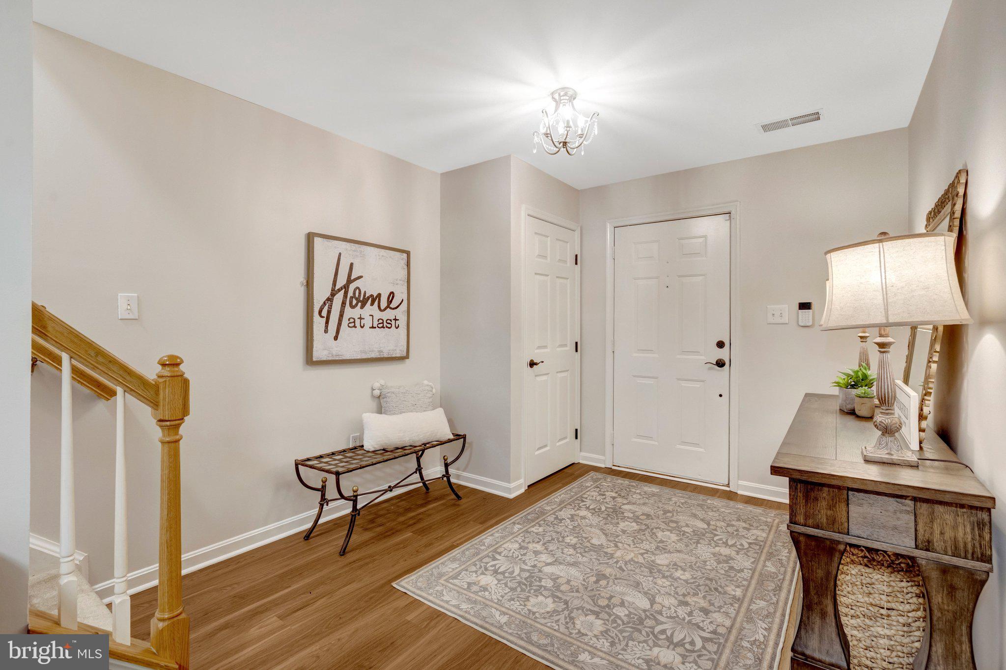 7706 Shadowcreek Terrace Springfield, VA 22153 - Photo 23 of 30 a living room with furniture and a table