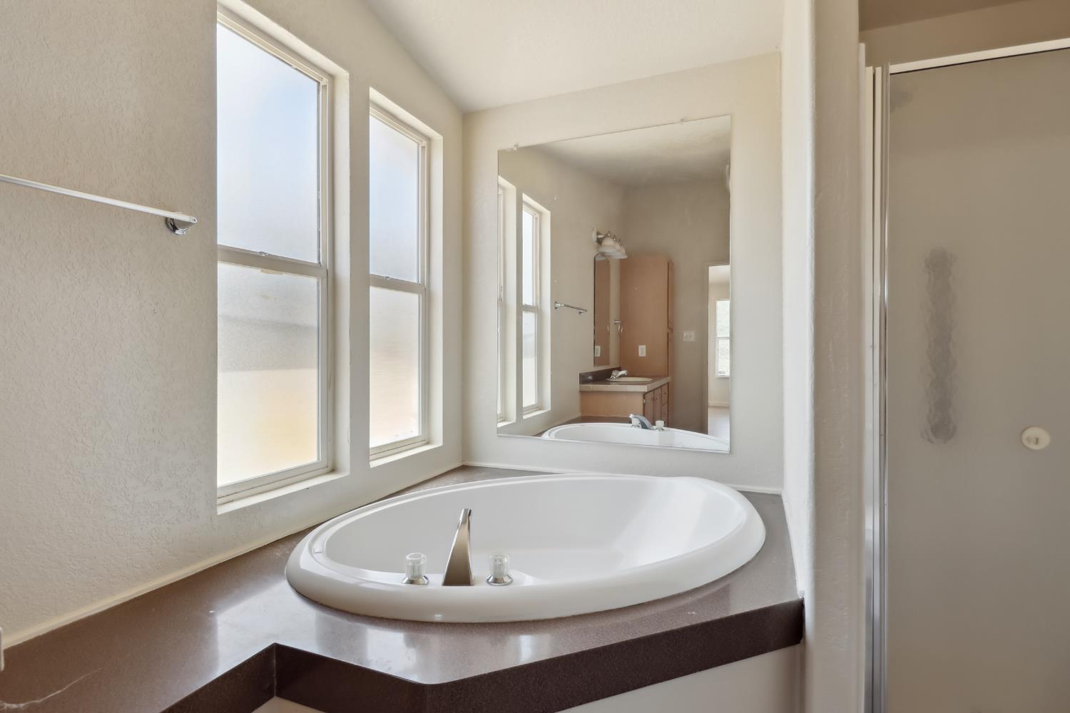 22115 Pleasant Valley Road North San Juan, CA 95960 - Photo 20 of 85 a white bath tub sitting next to a white sink