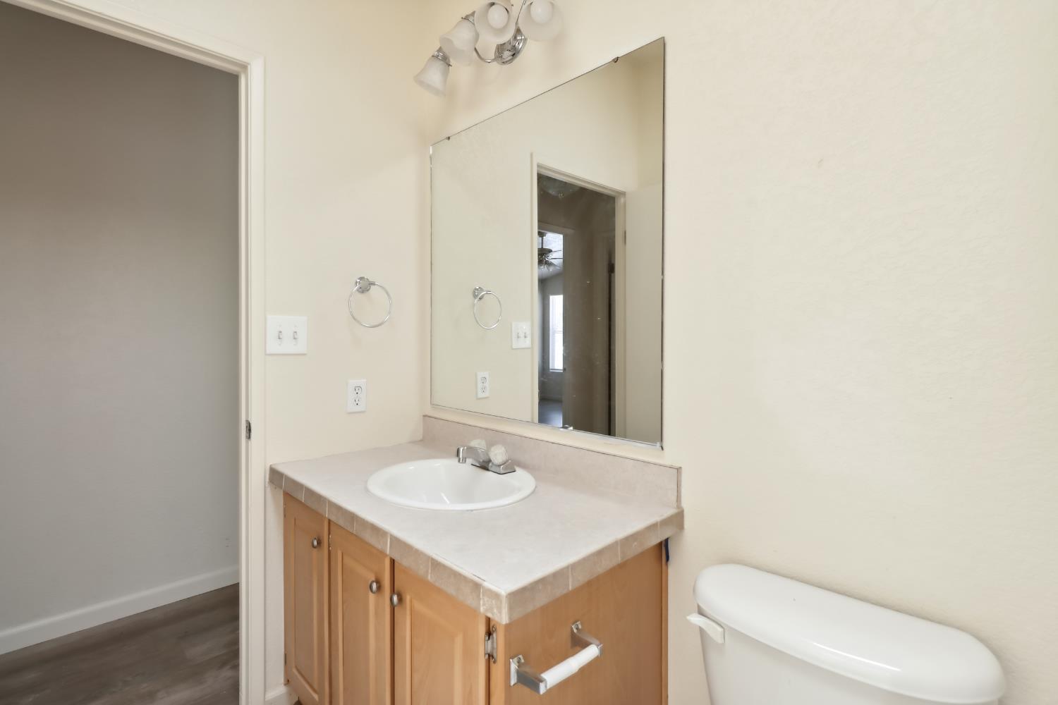 22115 Pleasant Valley Road North San Juan, CA 95960 - Photo 29 of 85 a bathroom with a sink and a toilet