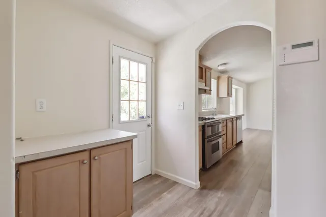 a house view with a garden space