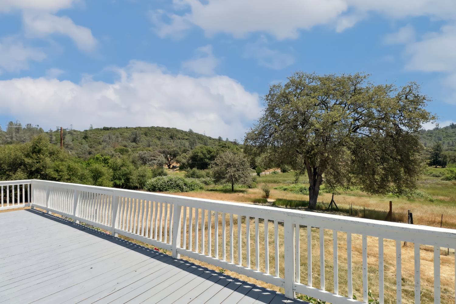 22115 Pleasant Valley Road North San Juan, CA 95960 - Photo 36 of 85 a view of a balcony with wooden fence