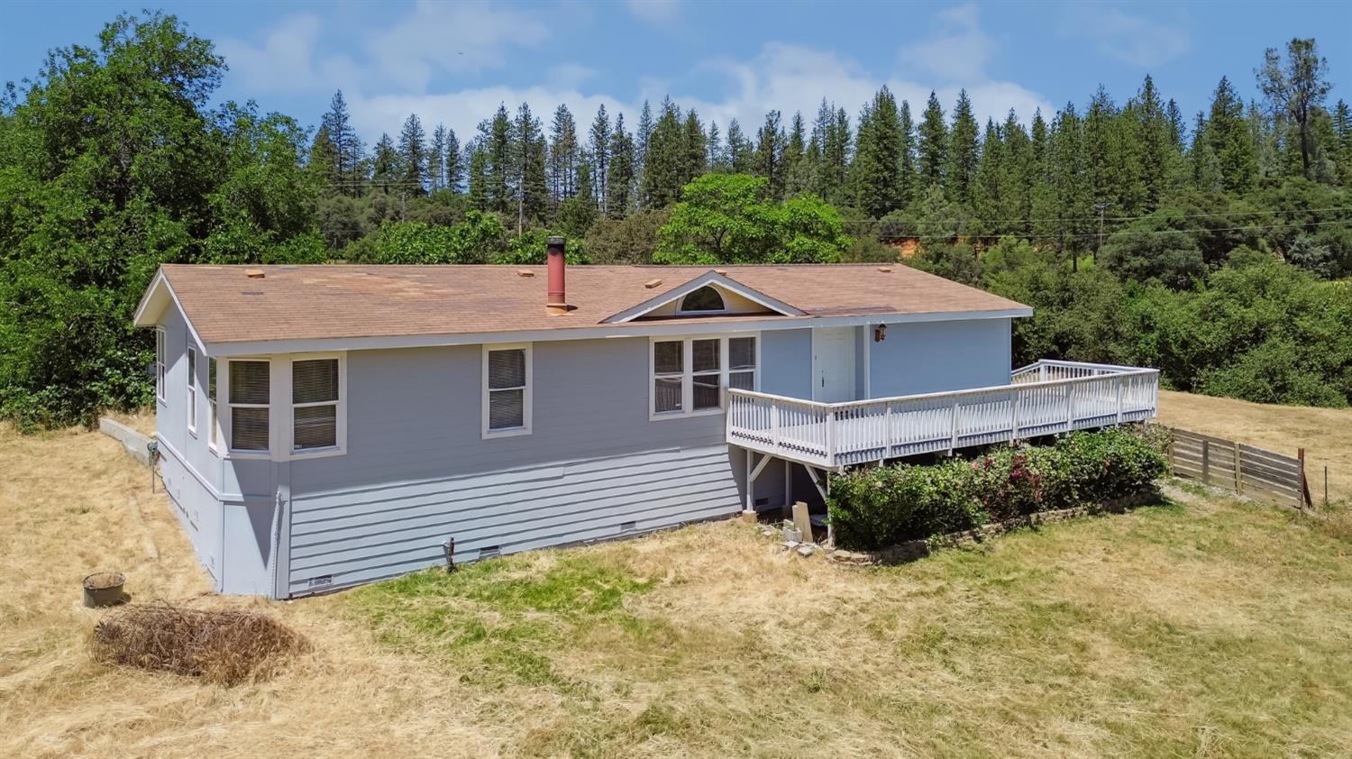 22115 Pleasant Valley Road North San Juan, CA 95960 - Photo 39 of 85 a aerial view of a house with a yard and large tree