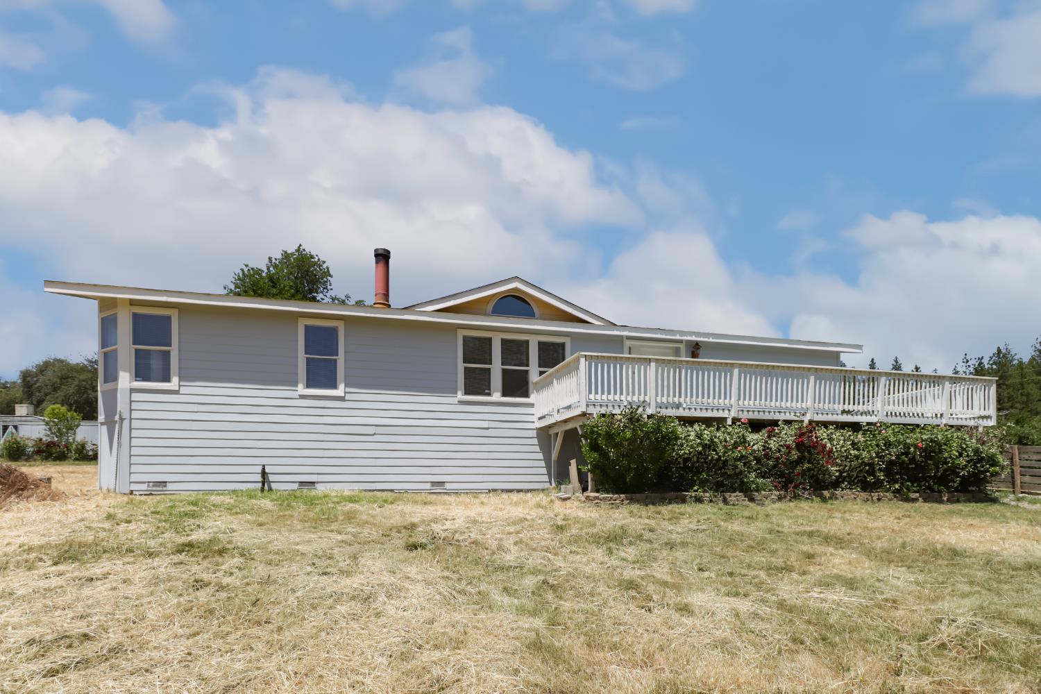 22115 Pleasant Valley Road North San Juan, CA 95960 - Photo 49 of 85 a front view of a house with a yard
