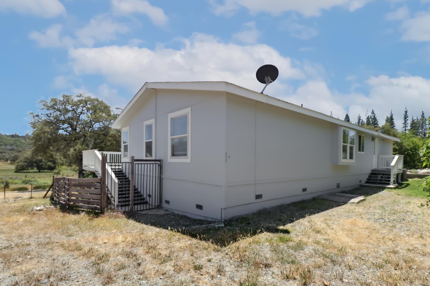 22115 Pleasant Valley Road North San Juan, CA 95960 - Photo 51 of 85 a view of a house with a snow in the background