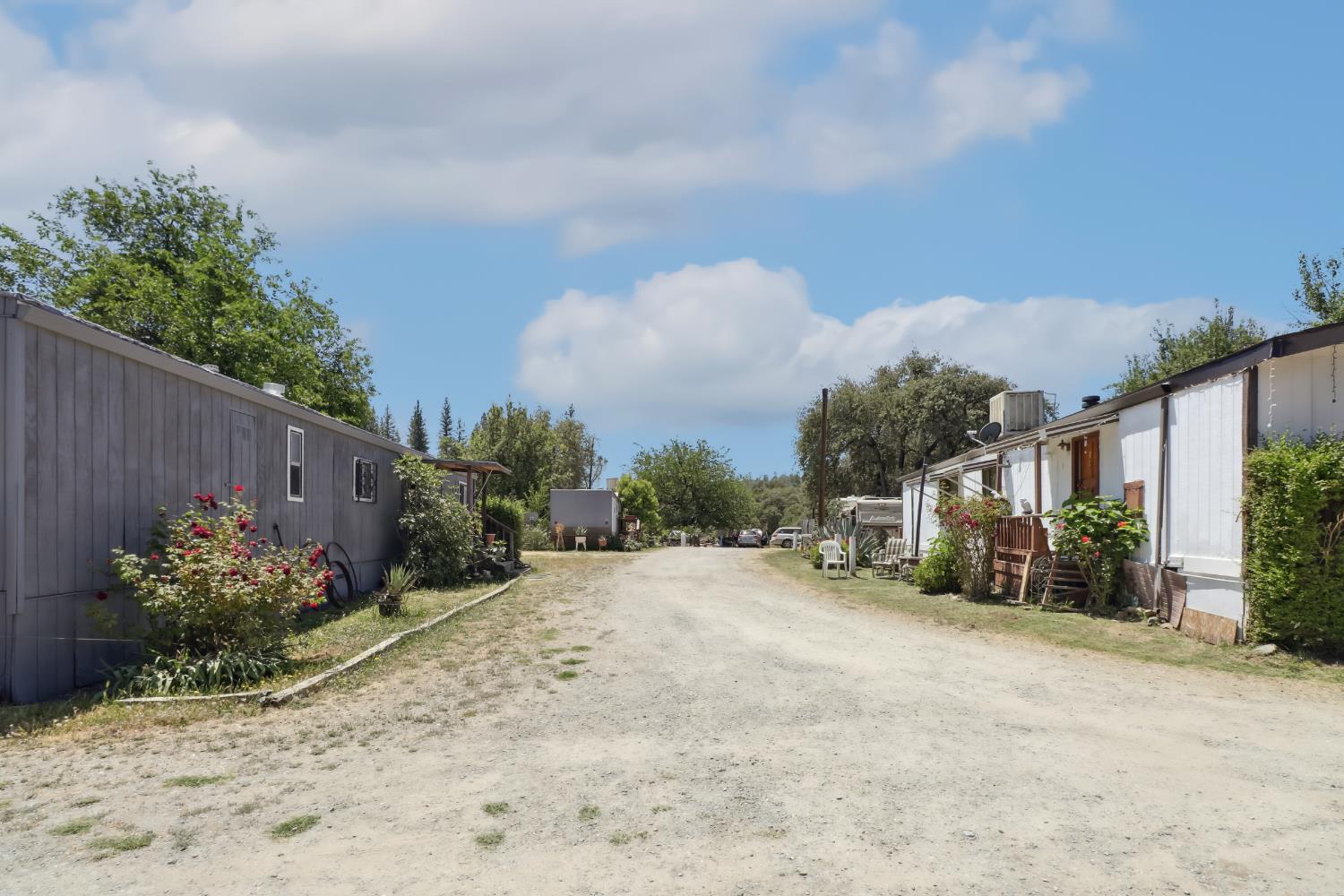 22115 Pleasant Valley Road North San Juan, CA 95960 - Photo 60 of 85 a view of a street with a bench in front of it