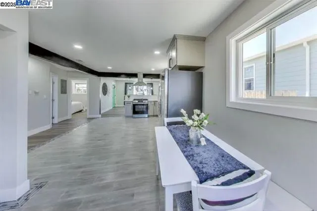 a living room with furniture and a table