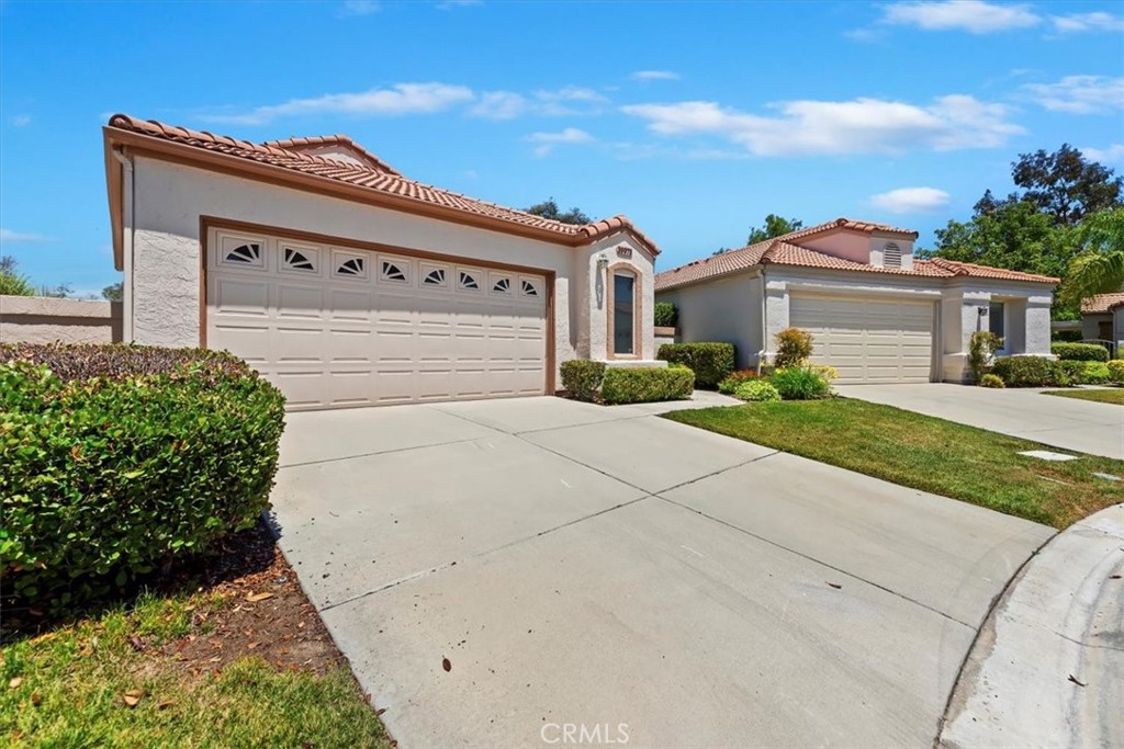 39973 Corte Lorca Murrieta, CA 92562 - Photo 4 of 72 front view of a house with a yard