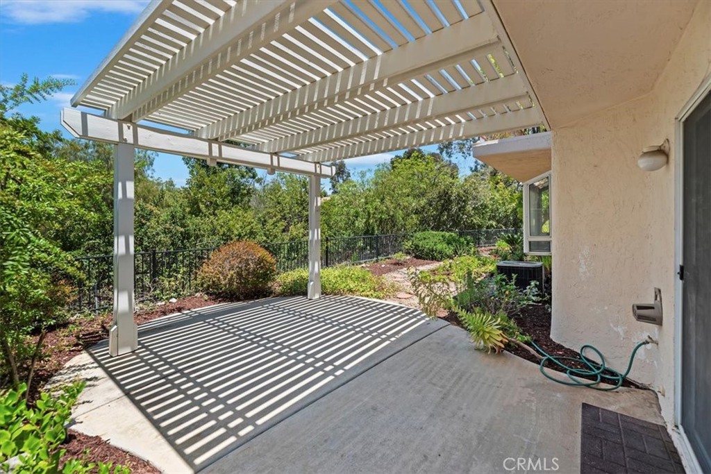 39973 Corte Lorca Murrieta, CA 92562 - Photo 43 of 72 a view of a backyard with plants and a patio