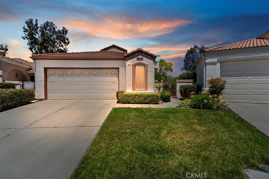 39973 Corte Lorca Murrieta, CA 92562 - Photo 46 of 72 a front view of a house with garden