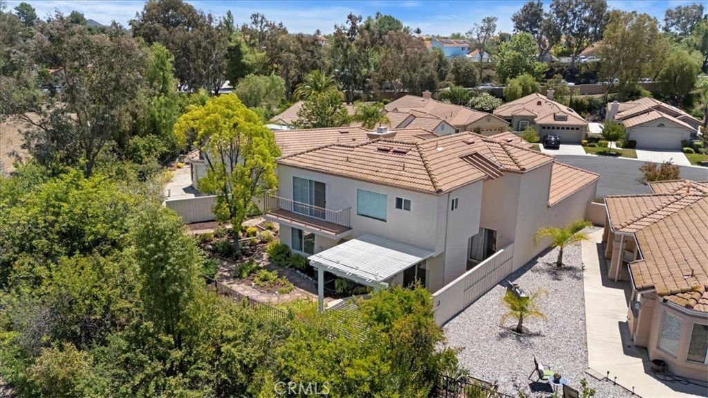 39973 Corte Lorca Murrieta, CA 92562 - Photo 54 of 72 an aerial view of a house with a yard and mountain view
