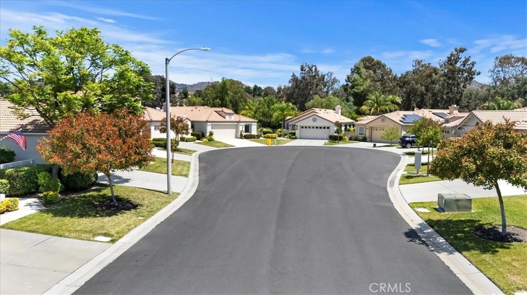 39973 Corte Lorca Murrieta, CA 92562 - Photo 56 of 72 a view of a swimming pool with a patio