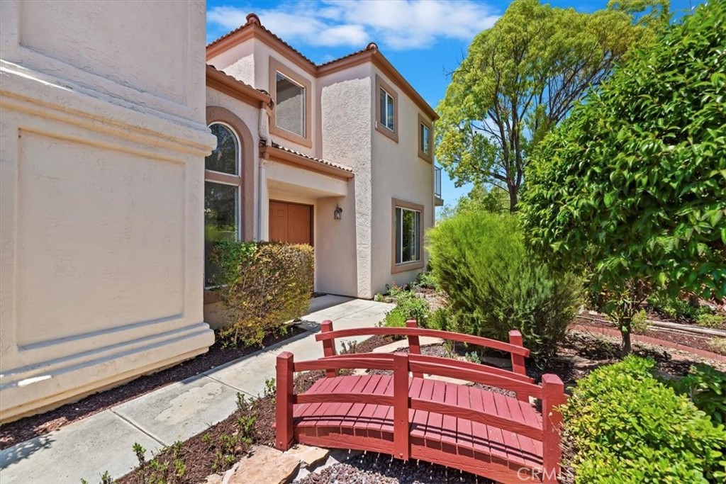 39973 Corte Lorca Murrieta, CA 92562 - Photo 7 of 72 a front view of a house with garden