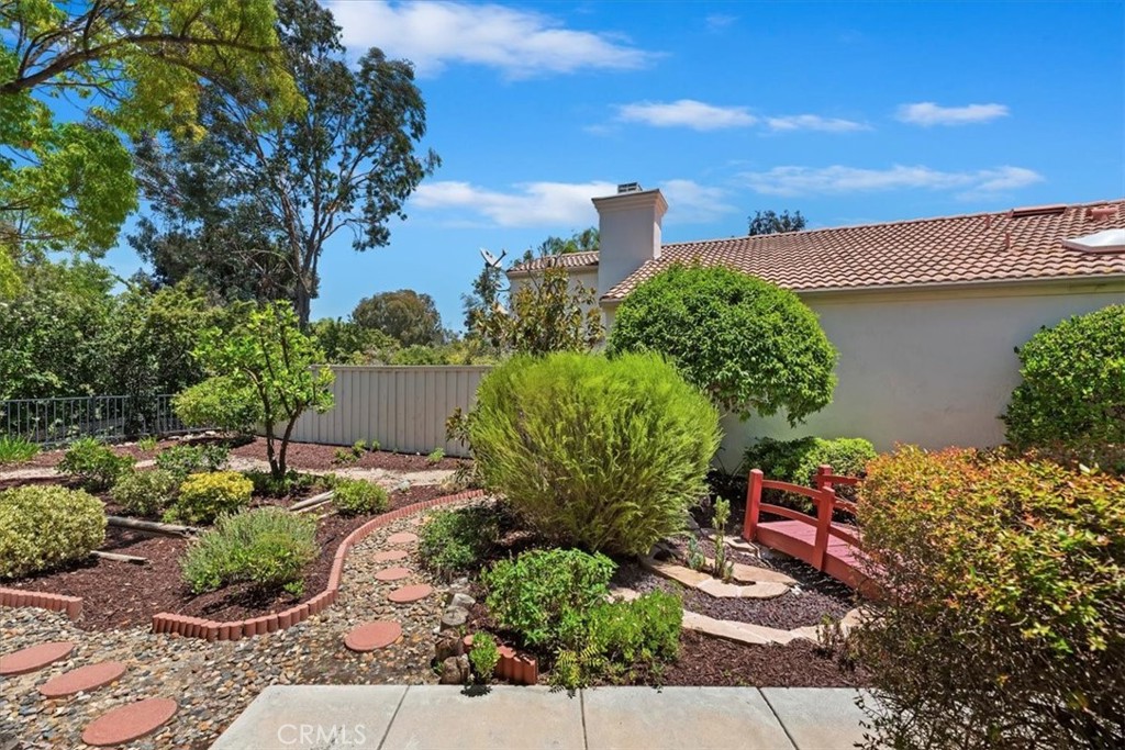 39973 Corte Lorca Murrieta, CA 92562 - Photo 8 of 72 a view of a garden with potted plants