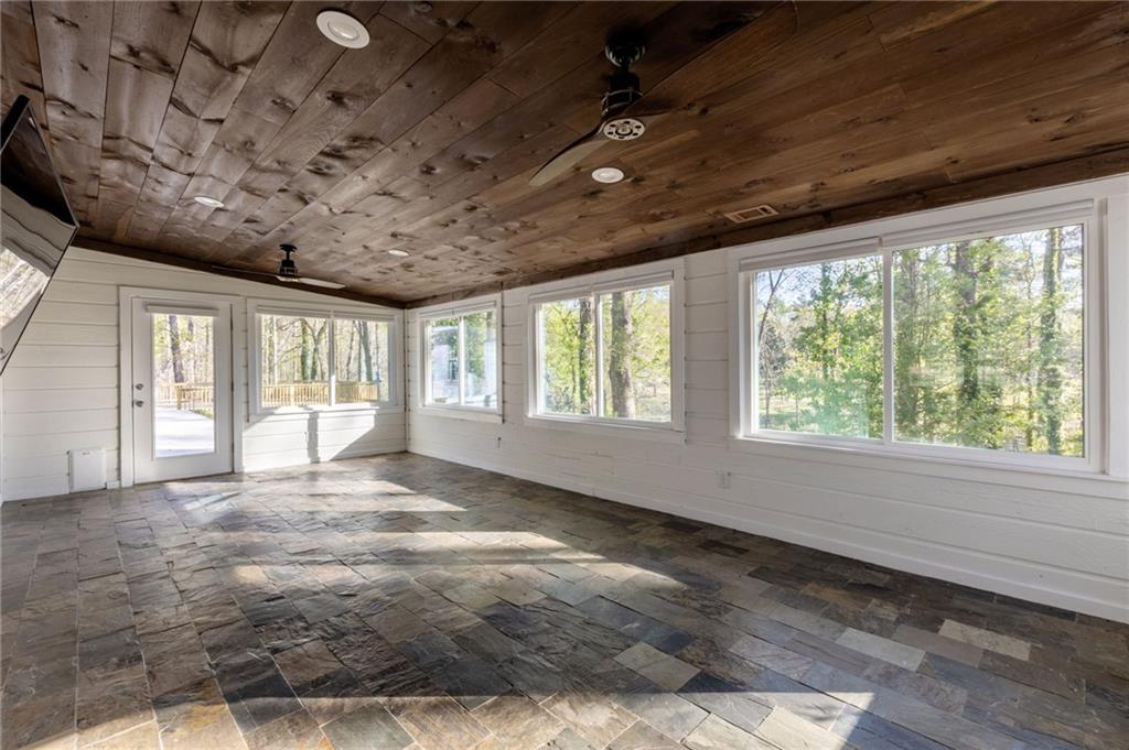 143 Swanson Road Fayetteville, GA 30214 - Photo 11 of 27 a view of an empty room with a window