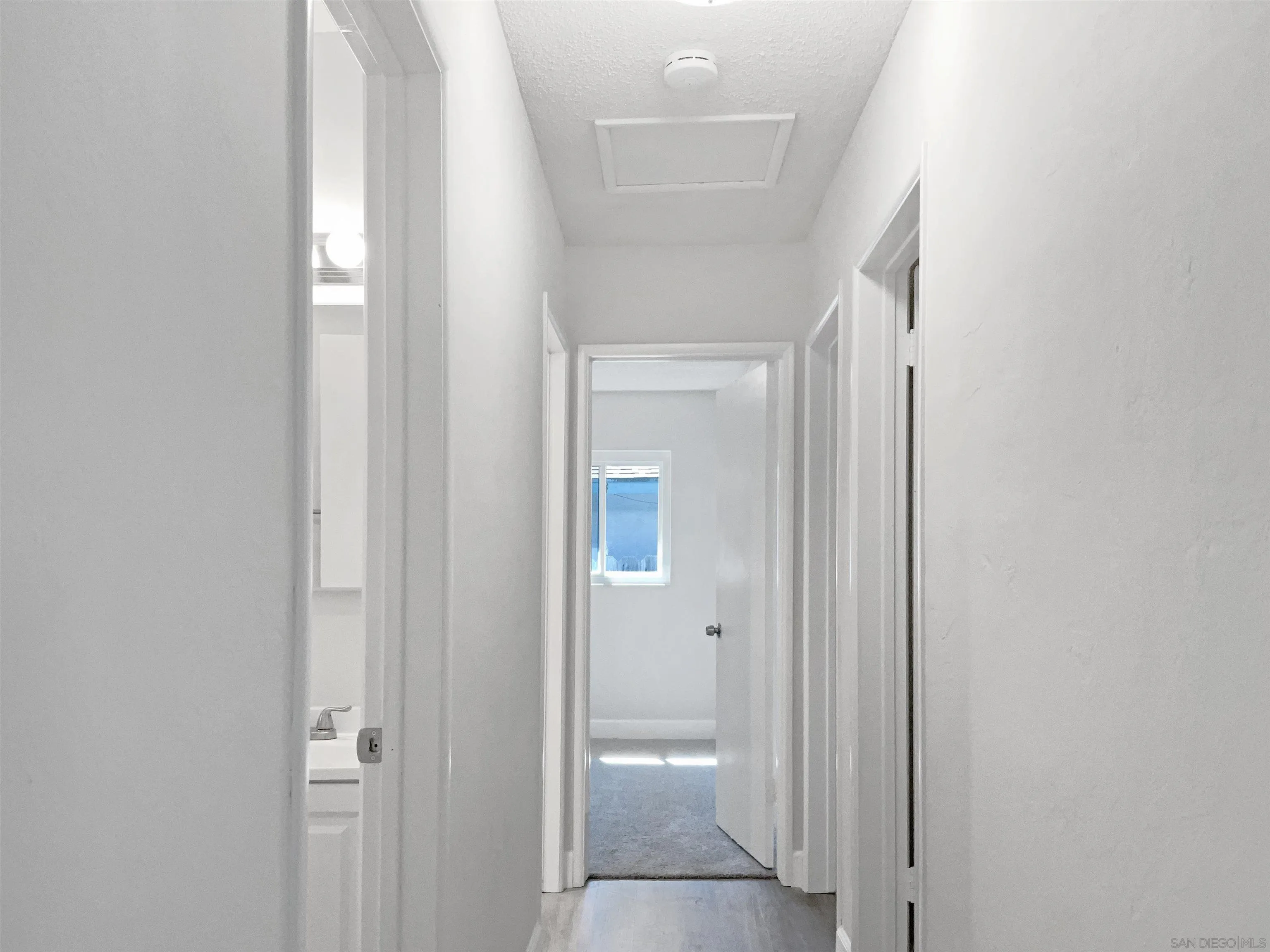 2850 Skyline Drive Lemon Grove, CA 91945 - Photo 12 of 17 a view of a bathroom from a hallway
