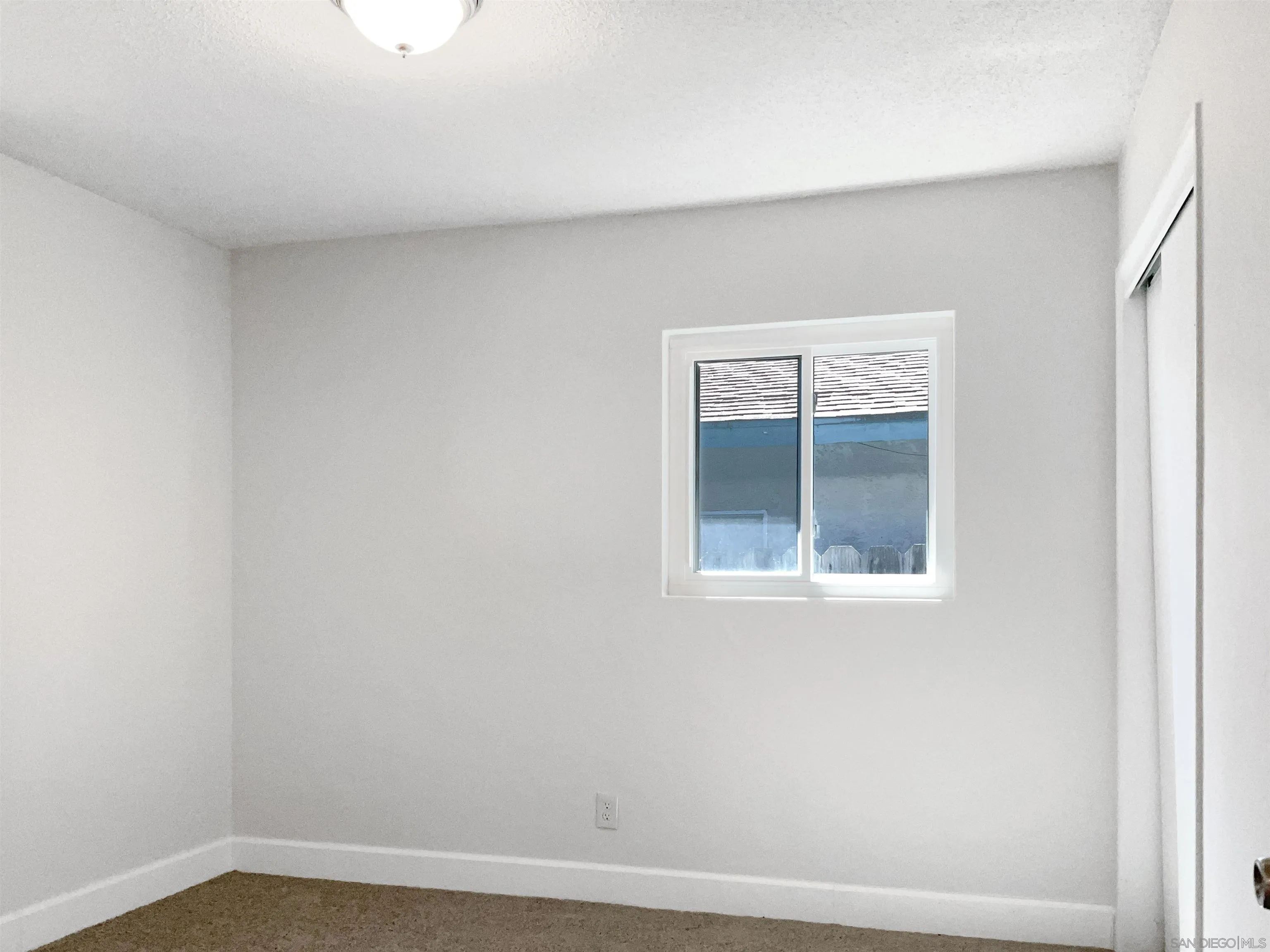 2850 Skyline Drive Lemon Grove, CA 91945 - Photo 15 of 17 a view of an empty room with a window