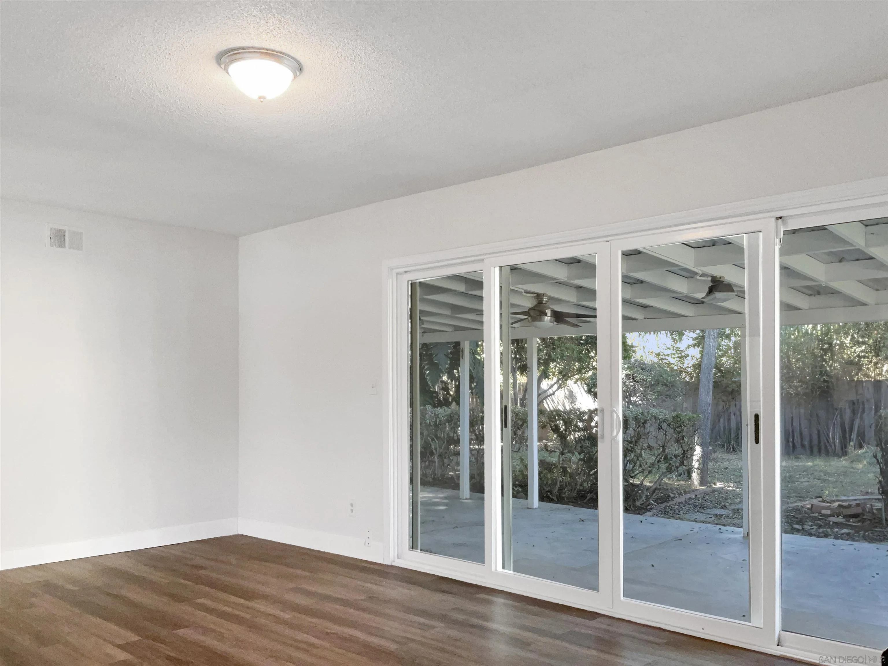 2850 Skyline Drive Lemon Grove, CA 91945 - Photo 6 of 17 a view of an empty room with glass door