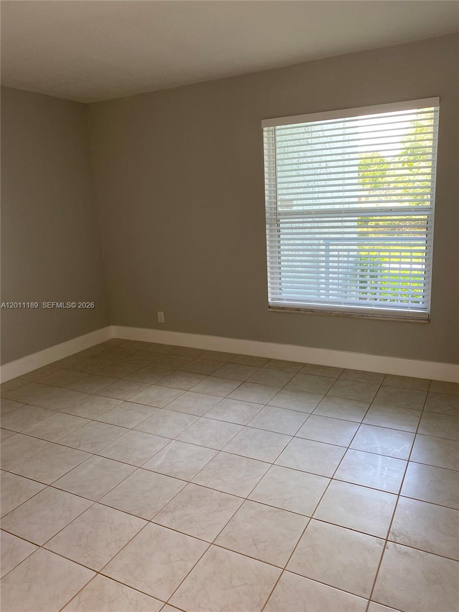 455 South Pine Island Road, Unit 110C Plantation, FL 33324 - Photo 11 of 30 a view of a room that has a window in it
