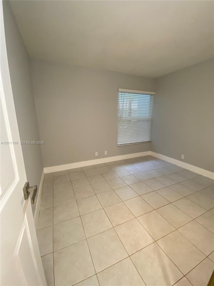 455 South Pine Island Road, Unit 110C Plantation, FL 33324 - Photo 17 of 30 a view of room with window