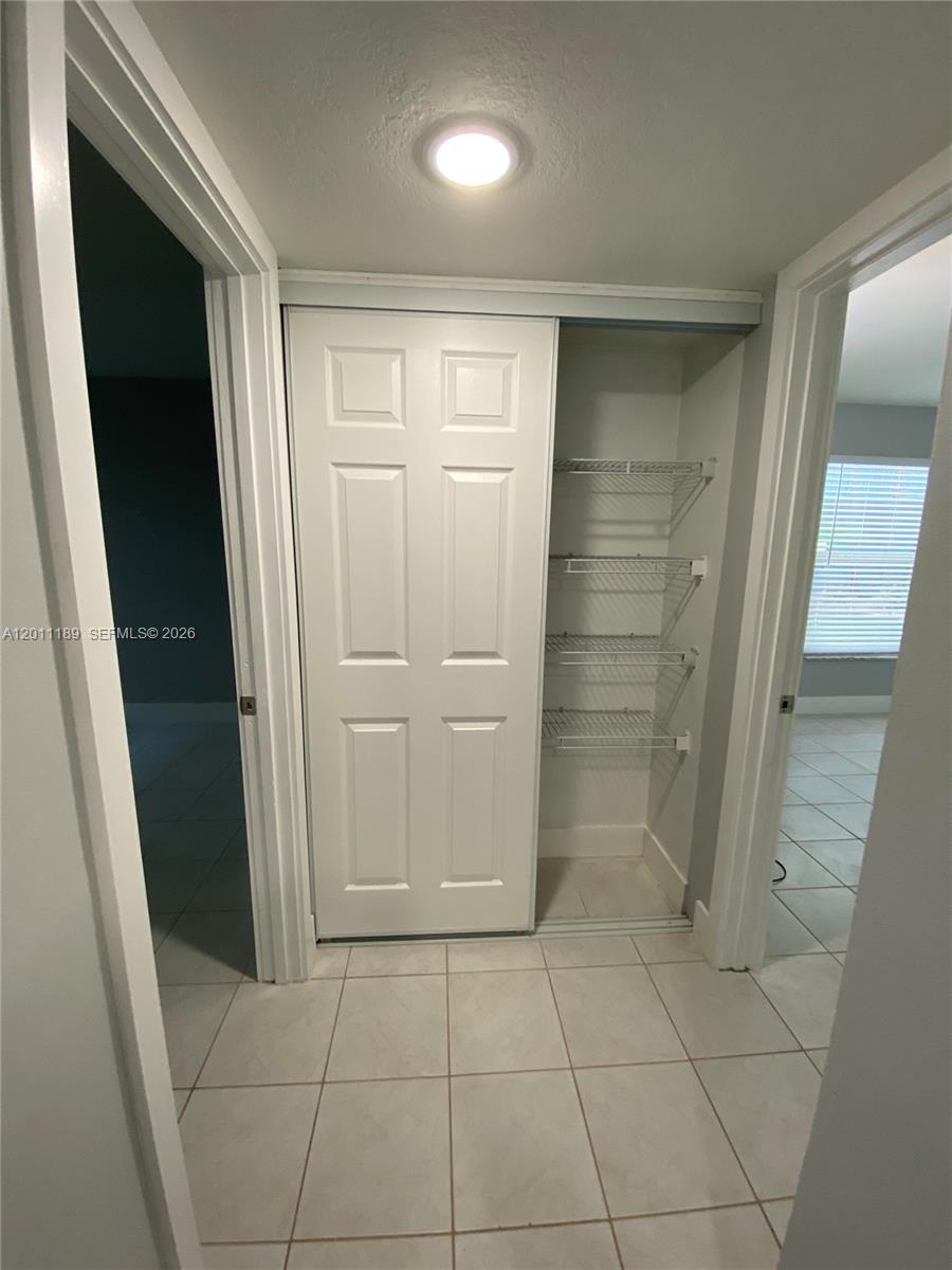 455 South Pine Island Road, Unit 110C Plantation, FL 33324 - Photo 20 of 30 a bathroom with a shower and a mirror