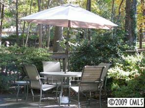 2816 High Ridge Road Charlotte, NC 28270 - Photo 3 of 8 a patio with table and chairs