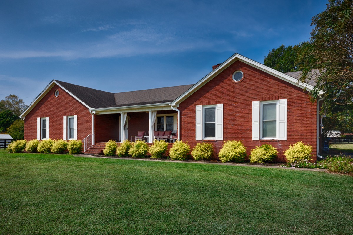 18563 Yarbrough Road Athens, AL 35613 - Photo 1 of 42 a front view of a house with garden