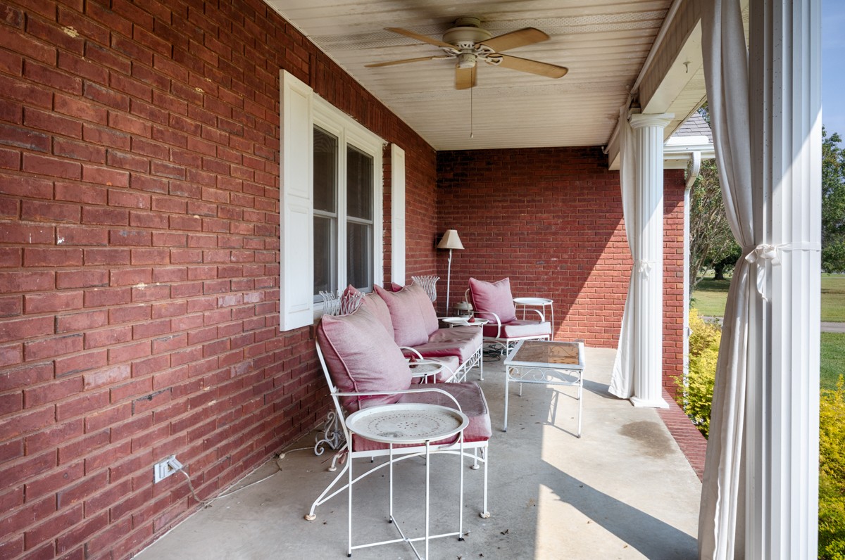 18563 Yarbrough Road Athens, AL 35613 - Photo 6 of 42 a couple of chairs sitting in front of a building
