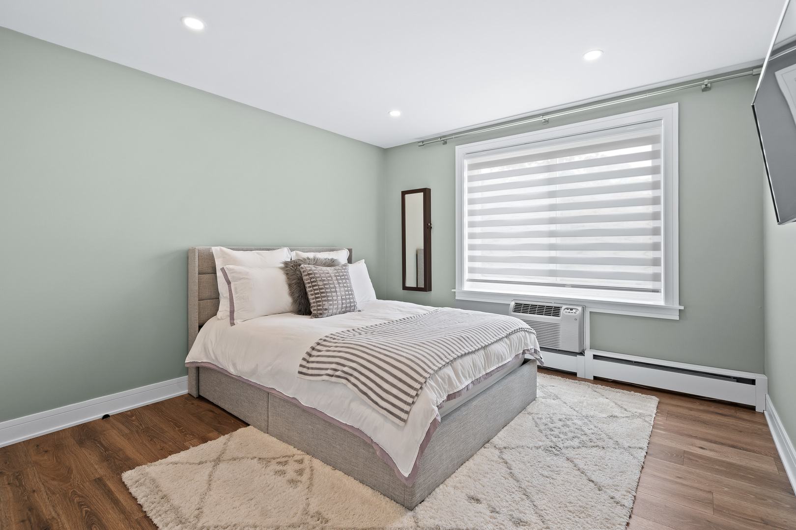 1207 South Old Wilke Road, Unit 209 Rolling Meadows, IL 60005 - Photo 11 of 22 a bedroom with a large bed and a window