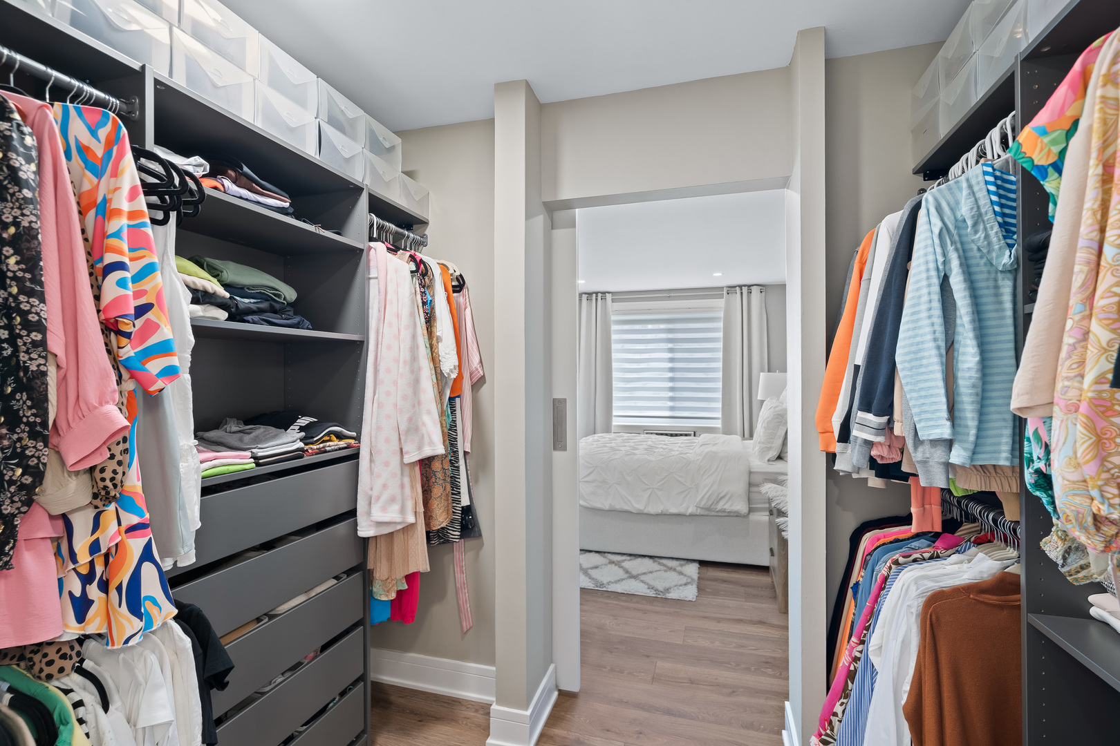 1207 South Old Wilke Road, Unit 209 Rolling Meadows, IL 60005 - Photo 14 of 22 a view of walk in closet with clothes and shoes