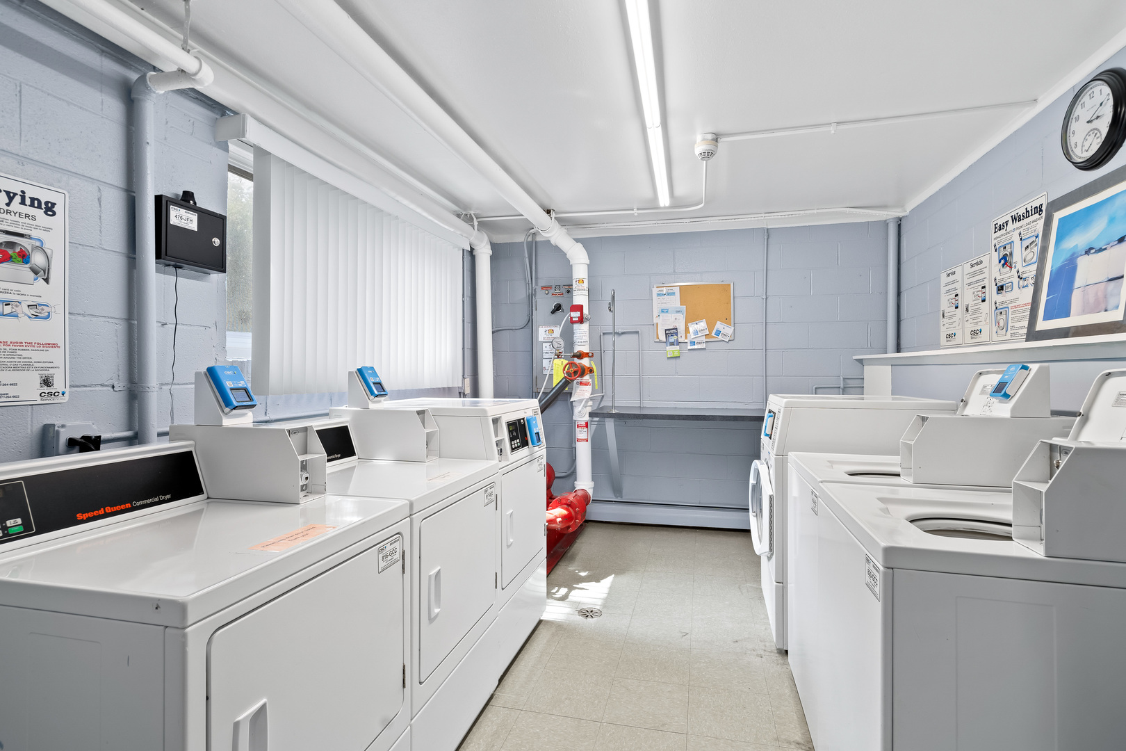 1207 South Old Wilke Road, Unit 209 Rolling Meadows, IL 60005 - Photo 19 of 22 a utility room with dryer and washer
