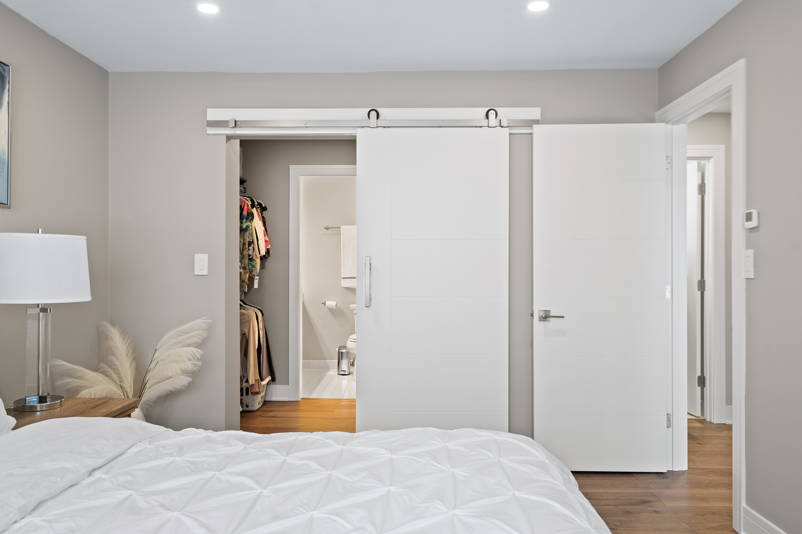 1207 South Old Wilke Road, Unit 209 Rolling Meadows, IL 60005 - Photo 10 of 22 a bedroom with a bed and a wooden floor