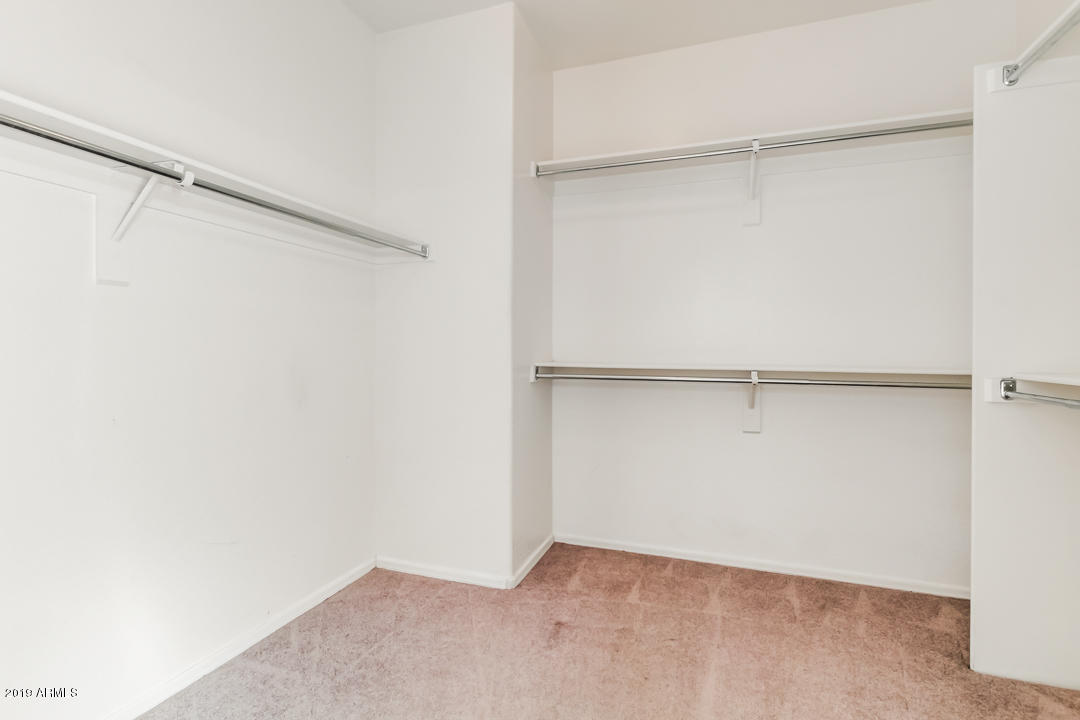 15917 West Calavar Road Surprise, AZ 85379 - Photo 20 of 40 a view of an empty walk in closet