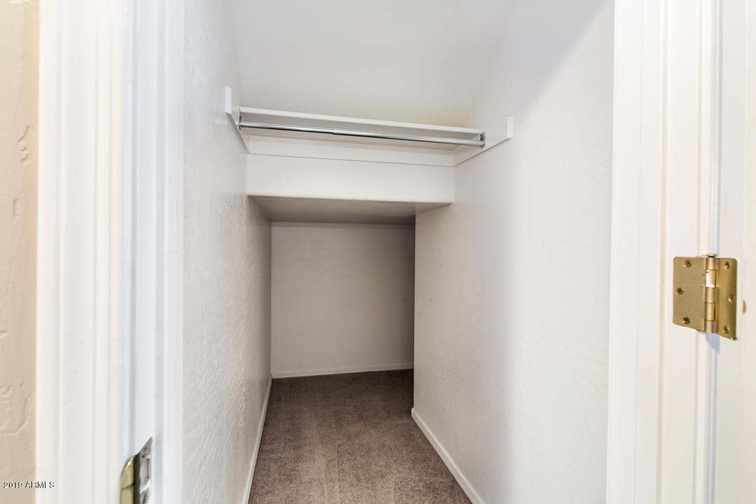 15917 West Calavar Road Surprise, AZ 85379 - Photo 29 of 40 a view of a hallway