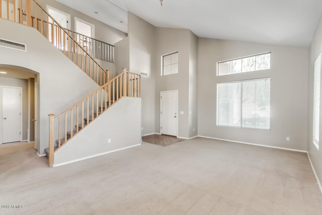15917 West Calavar Road Surprise, AZ 85379 - Photo 7 of 40 a view of an entryway with staircase